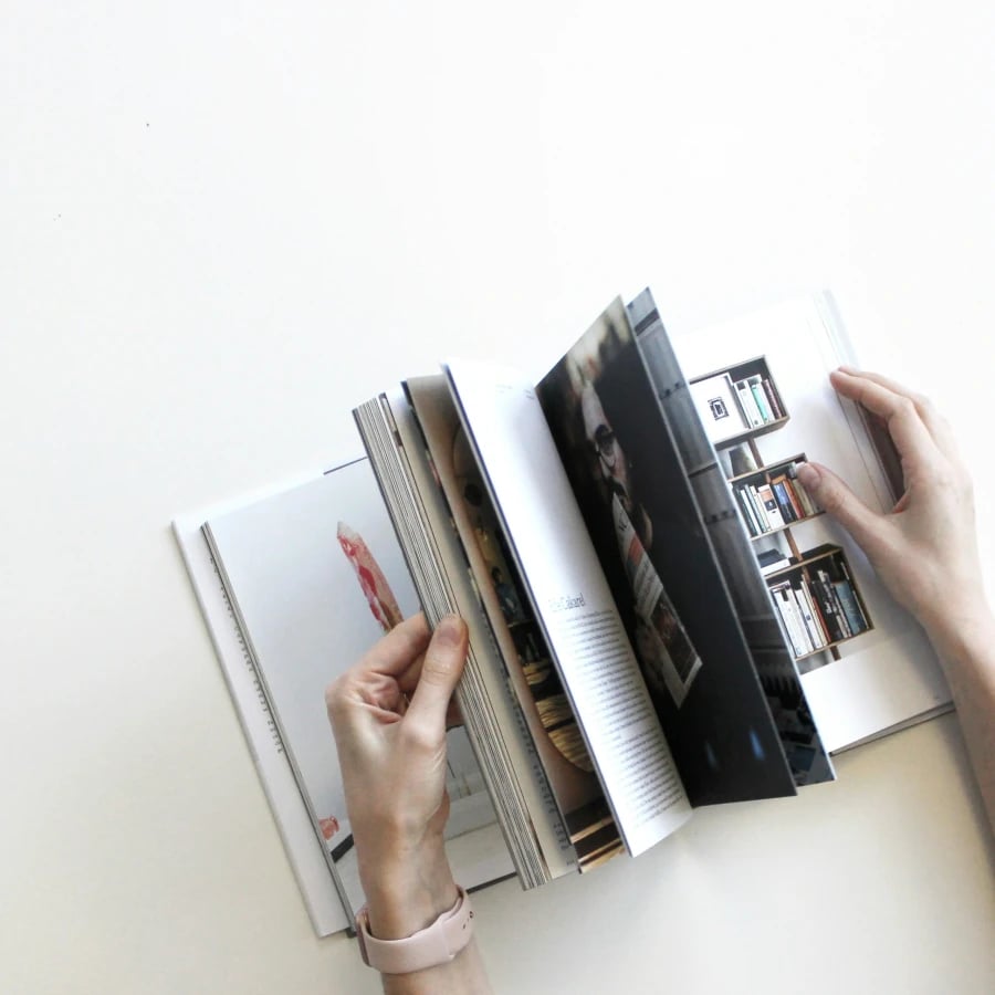 Pages of a book turning as if being read